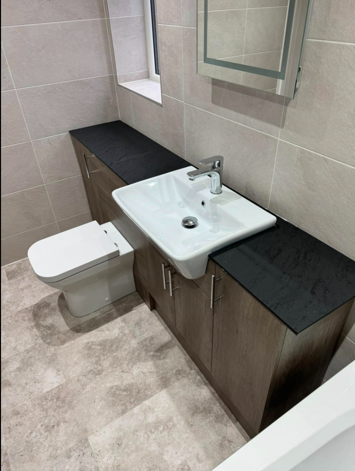 Toilet and basin vanity run installed by SMS Services