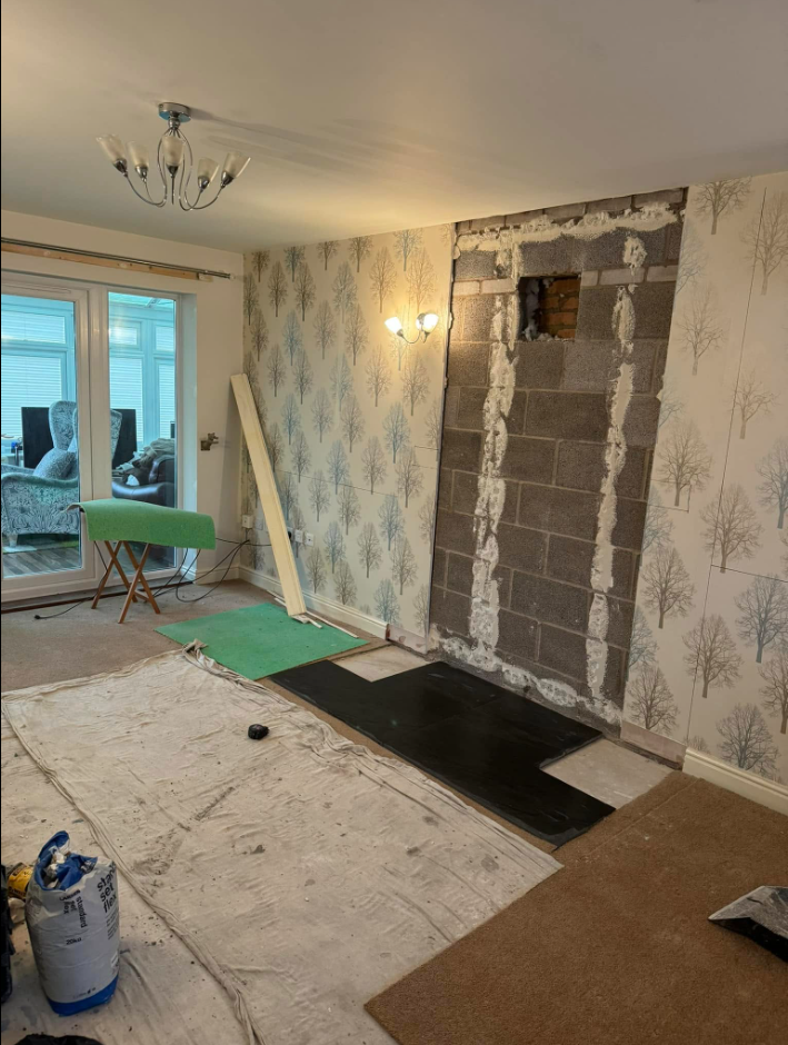 Fireplace opening formed and prepared during a stove installation
