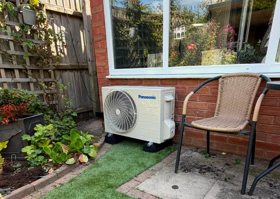 Panasonic outdoor unit installed on a domestic patio